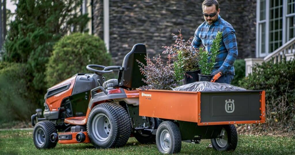 Man putting stuff on trailer kit